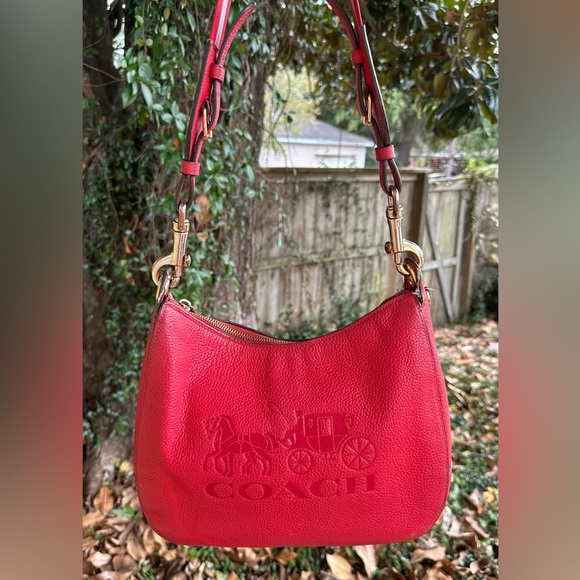 Coach Handbags - Coach Red Shoulder hobo Bag wt horse & carriage logo .